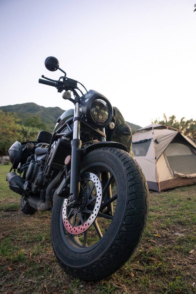 Motorbike close to tent in Vesuvius camping