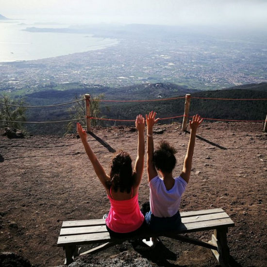 Two girl on the top of Mt. Vesuvius enjoying the view